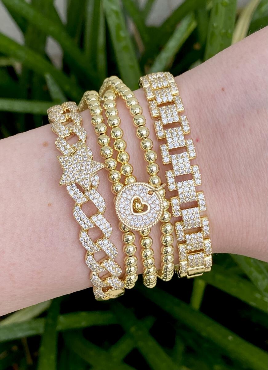 Triple Bracelet in Gold by Gemelli