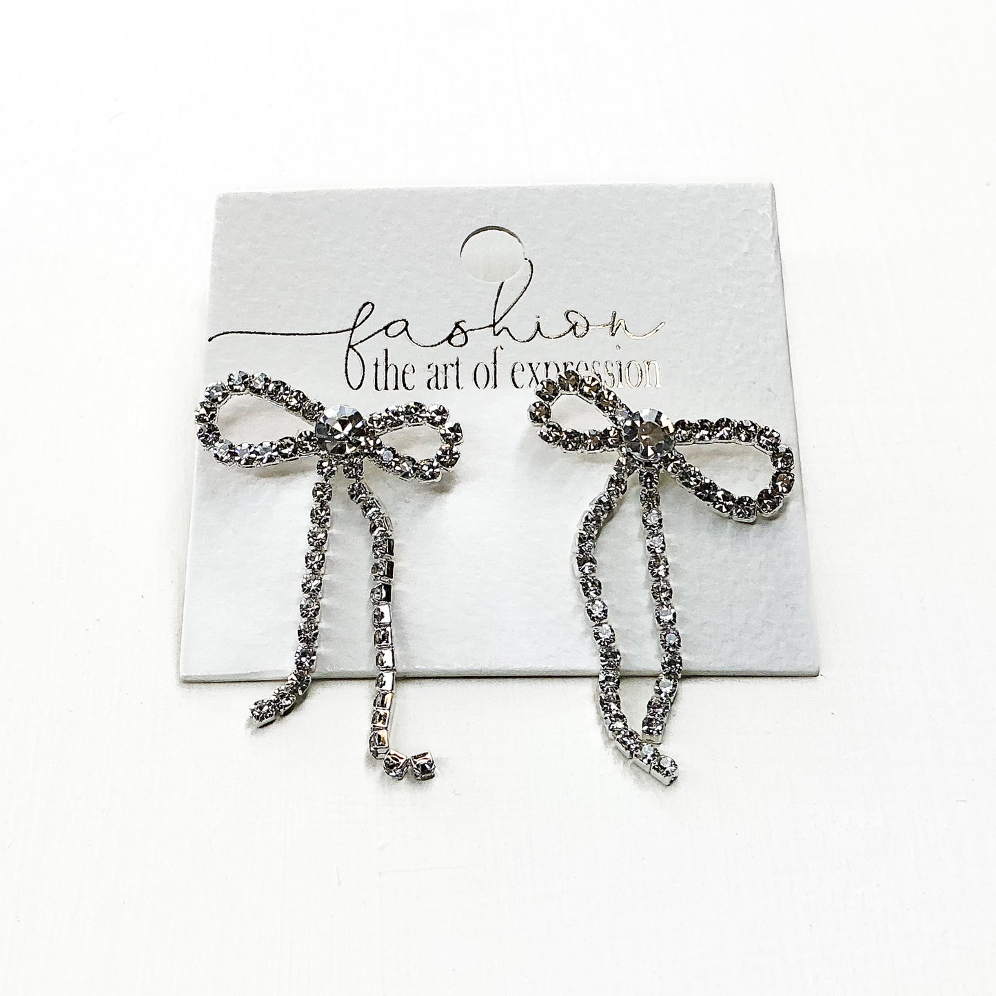 Diamond Bow Dangling Studs