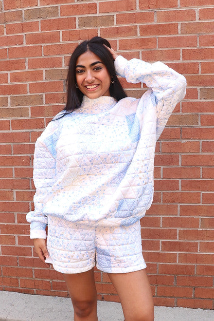 Quilted Floral Mock Neck in Pastel Blue