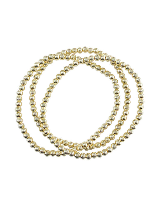 Triple Bracelet in Gold by Gemelli