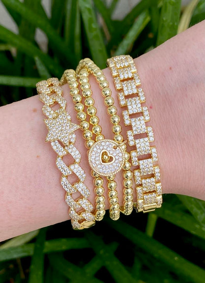 Triple Bracelet in Gold by Gemelli